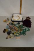A bag of various assorted costume jewellery and other items
