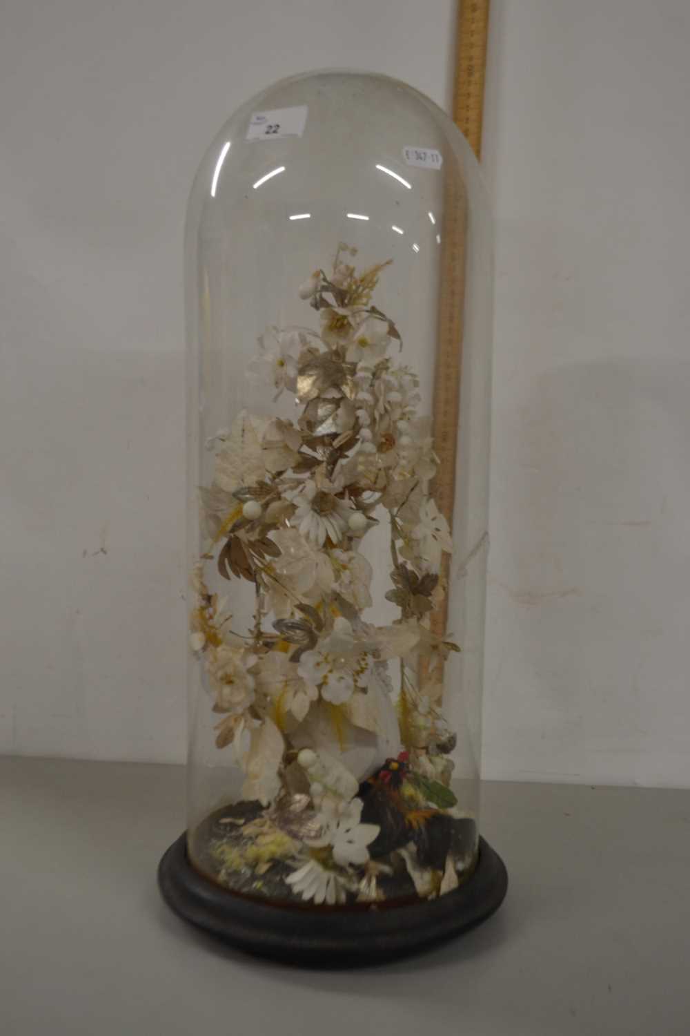 Simulated display of flowers under a glass dome