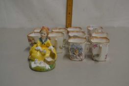 Small Royal Doulton figurine Picnic together with Doulton Burslam coffee cans
