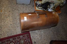 A vintage Singer sewing machine in wooden case