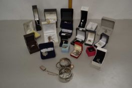 Bag containing a large collection of various boxed costume jewellery