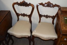 A pair of mahogany dining chairs