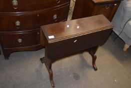 A reproduction Sutherland style drop leaf table
