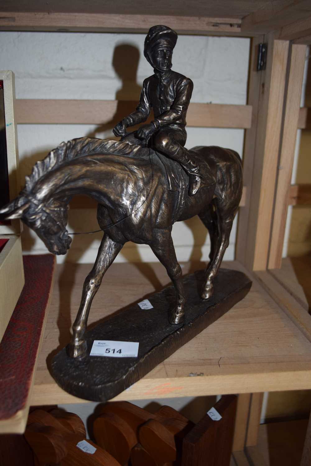 A resin model of a horse with jockey up