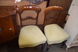 A pair of mahogany dining chairs