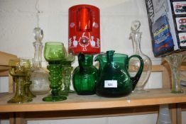 Mixed Lot: Glass ware to include green glass jugs, vine engraved decanters and others