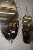 An oval wall mirror in a metal frame plus one other (2)