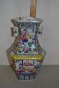 A Chinese porcelain vase of shaped form with polychrome decoration of Chinese characters, 28cm high