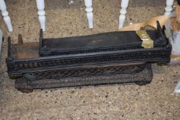Group of three small cast iron fire fenders
