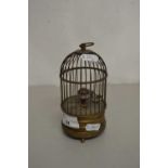 A contemporary bird in a cage, musical novelty clock