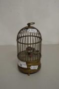 A contemporary bird in a cage, musical novelty clock