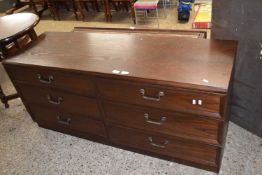 A dark wood finish six drawer chest