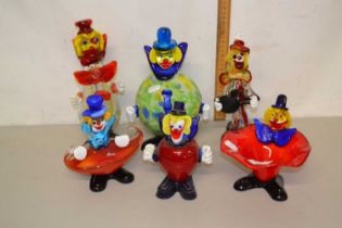 A collection of six various Murano glass clowns
