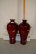 Pair of contemporary Art Glass vases together with three reproduction auction posters