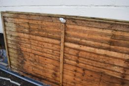 Two small wooden fencing panels
