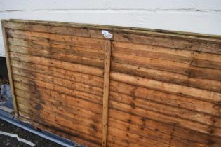 Two small wooden fencing panels