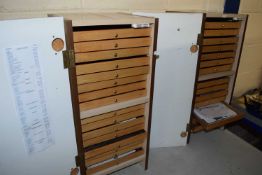 Two modern collectors cabinets containing a small quantity of metal detecting finds
