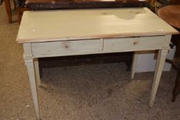 A painted pine two drawer side table