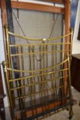 A brass, iron and wood single bed frame