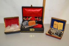 Three boxes of various assorted costume jewellery