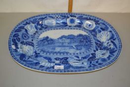 A large Victorian blue and white meat plate with floral border