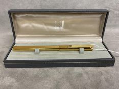 A gold plated Dunhill ball point pen in original box