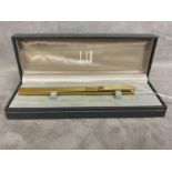 A gold plated Dunhill ball point pen in original box