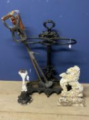 A Victorian/cast iron "style" hall stick stand, 73cmH, with two old shooting sticks, and a pair of