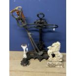 A Victorian/cast iron "style" hall stick stand, 73cmH, with two old shooting sticks, and a pair of