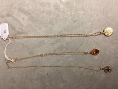 An 18ct gold chain link necklace with a gold citrine set pendant together with a 15ct gold fancy