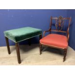 Stool with green velvet upholstered seat, and a Victorian low arm chair, with red upholstered