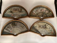 Four C18/C9th style painted fans in a gilt glazed box, frames each 54 x 31cm