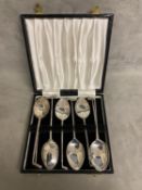 A set of Sterling silver 8 teaspoons with golf club finials boxed by Edward Viner, Sheffield