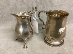 Two Sterling silver items, a small mug on circular stepped foot, by Samuel Goobechere and Edward