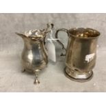 Two Sterling silver items, a small mug on circular stepped foot, by Samuel Goobechere and Edward