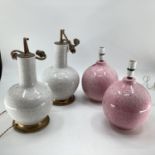 A pair of bulbous white and all over crackle glaze table lamps, with brass style base and fittings