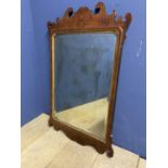 a wooden and gilt framed wall mirror, 100 x 55