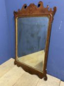 a wooden and gilt framed wall mirror, 100 x 55