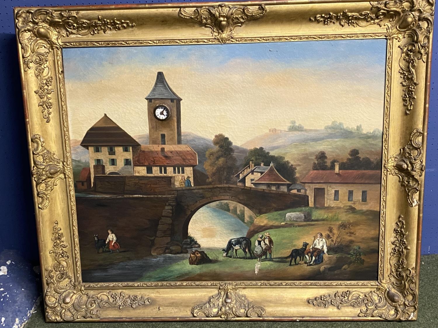 C19th Continental oil on canvas Clock and Musical box picture. Naive village scene. Repaired hole to - Image 2 of 3