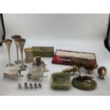A collection of metalware to include gilt metal birds, foxes, boxed carving set, onyx ash trays etc