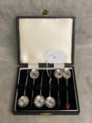 A boxed set of Sterling Silver coffee spoons with bean finials
