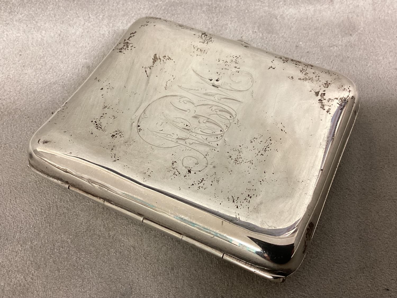 A Sterling silver Hip shaped cigarette case by Sampson Mordeon & Co, London, 1895, 109g