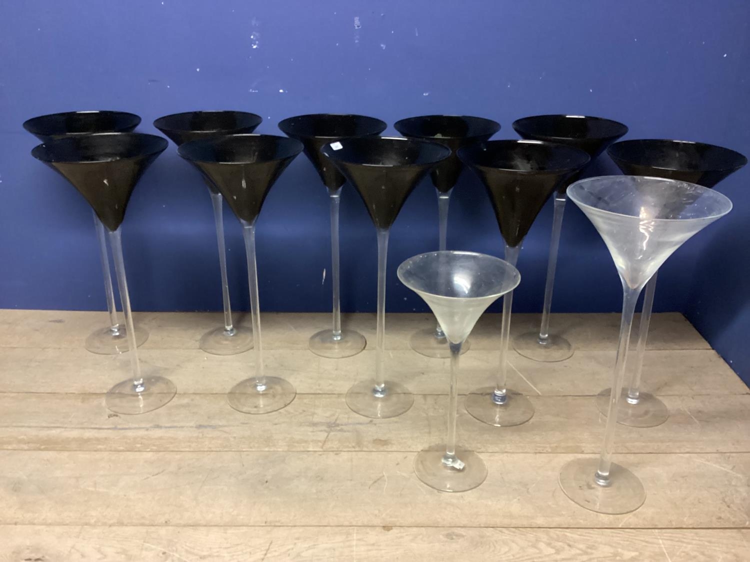 Eleven tall narrow and fluted decorative glasses (were previously used by wedding flowers co)