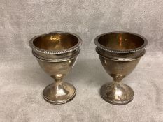 A pair of Georgian silver egg cups with gilt interiors by Solomon Hougham, London 1811, 98g