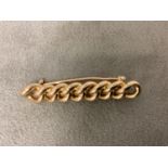 A 15ct gold knot brooch 5.9g