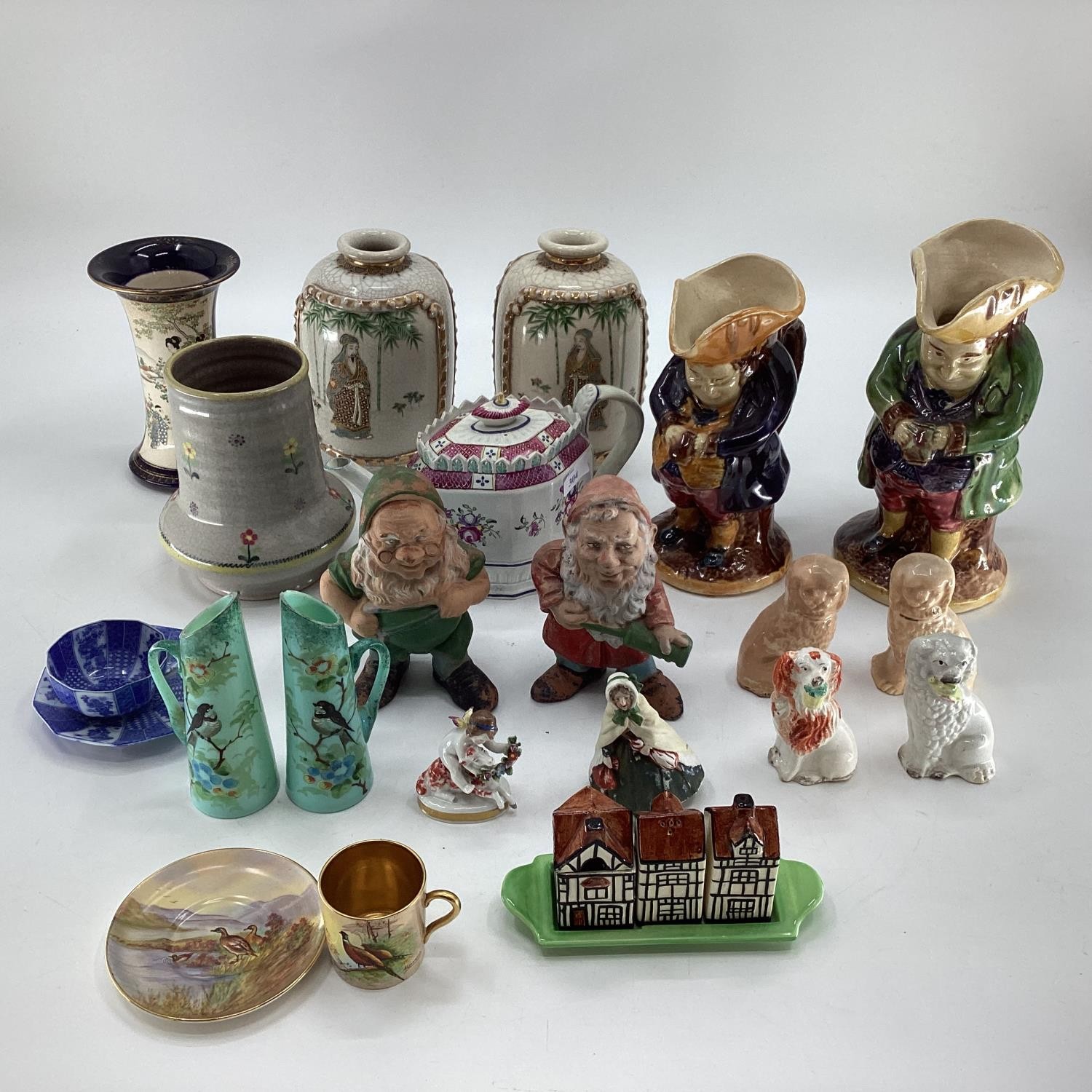 Quantity of ceramics, to include: pair of Japanese Imari satsuma vasses, Toby jugs, etc