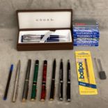 A collection of fountain pens and other pens to include two Watermans, Cross and others