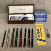 A collection of fountain pens and other pens to include two Watermans, Cross and others