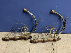 A Pair of scrolling Arts & Crafts style wall light fittings on wooden mount