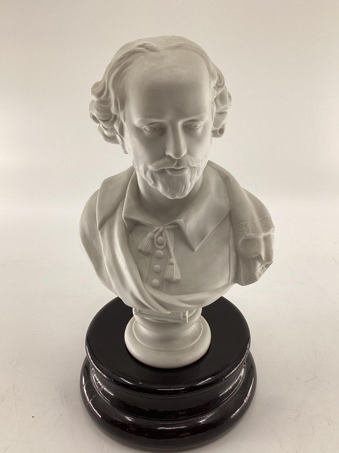 A Parian ware bust of William Shakespeare on a turned lacquered socle base 37cm